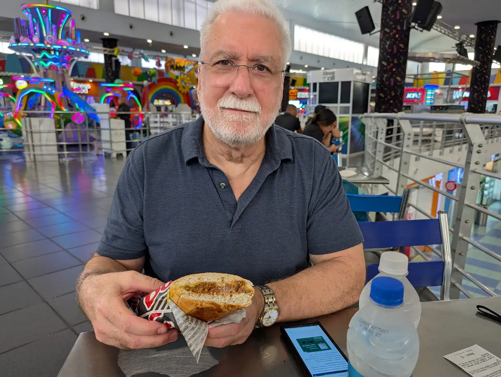 Brian at Don Pan bakery in Albrook Mall with a large sandwich