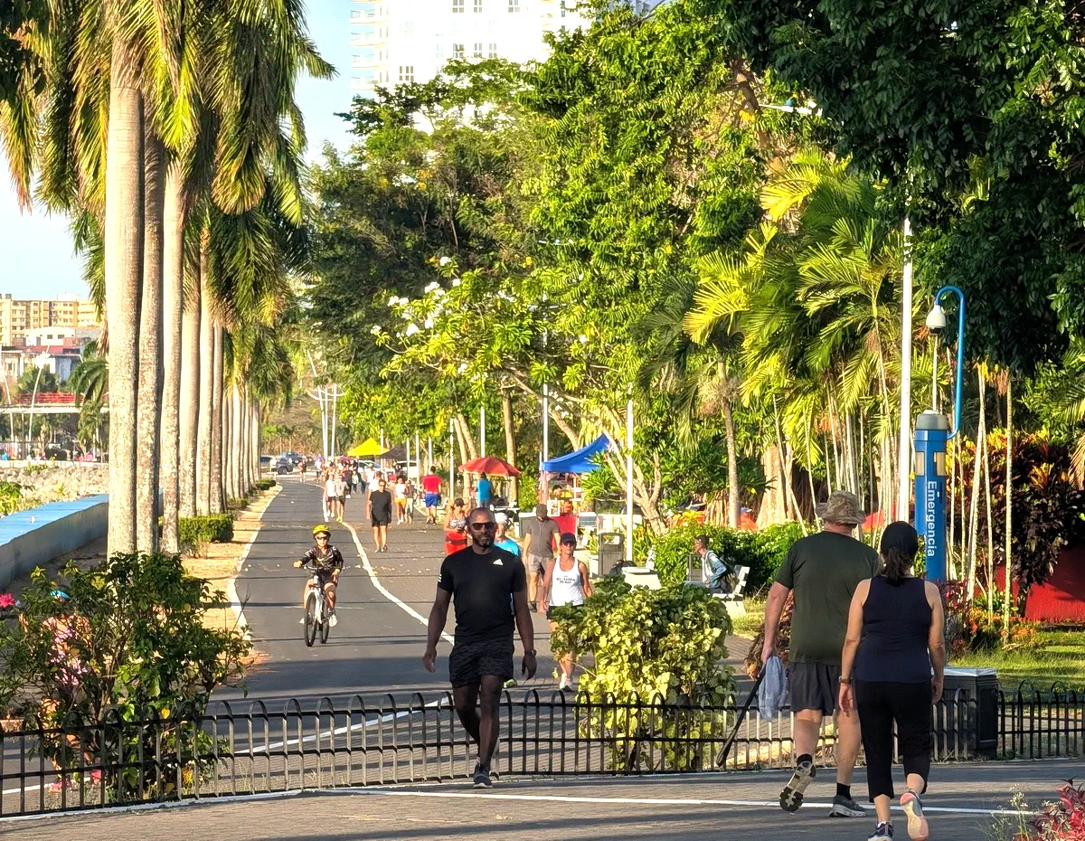 Cinta Costera waterfront greenbelt in Panama City on a Sunday morning with cyclists and walkers