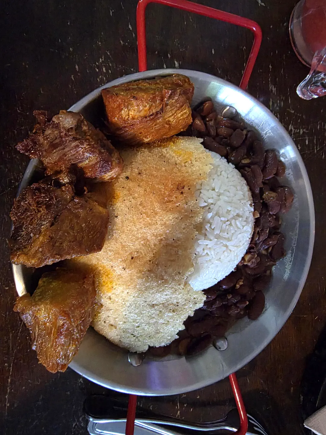 Brian's Concolon Con Lechona - fried pork with fried rice at Concolon restaurant Panama City